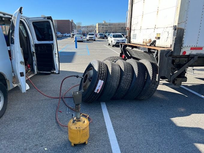 Truck Tire Installation in Bronx, NY. Tires being filled with air.